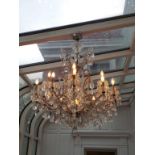 *20th c "Maria Teresa" Style Chandelier crystal and brass with eighteen lights. 44"h x 40"w Good
