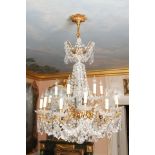*20th c American Gilt Bronze Chandelier with glass prisms. 52" x 32" Good