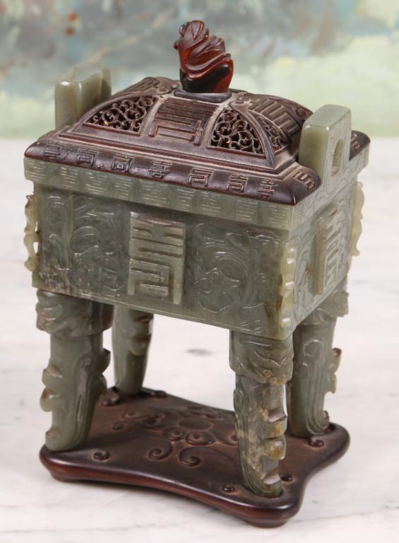 C1880 Carved Chinese Green Jade Sensor supported by four legs, with rosewood fretwork cover and