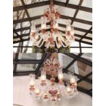 Pair of 20th c Large Matching Glass Chandeliers each having ten arms in gilt decorated ruby and