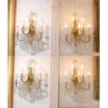 Set of Four 20th C Ormolu and Crystal Sconces Louis XVI Style. 25"h x 17" w Good condition