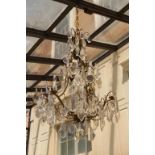 C1870 French Napoleon III Chandelier birdcage style with gilt bronze and cut crystal plaquette drops