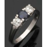 Ring mit Brillanten und einem Saphir585er WG, gestemp. 2 Brillanten zus. ca. 0,6 ct. 1 Saphir im