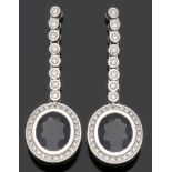 Paar elegante Saphirohrhänger mit Brillanten750er WG, gestemp. Punze: Juweliersmarke. 2 Saphire