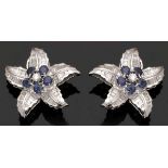 Paar Diamantohrstecker als exotische Blüten750er WG, ungestemp. 2 Brillanten zus. ca. 0,28 ct. 120