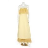 A yellow gazar evening dress, circa 1967, labelled 'made in France',