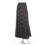 Three Yves Saint Laurent printed wool maxi skirts, circa 1976, Rive Gauche labelled and size 36,