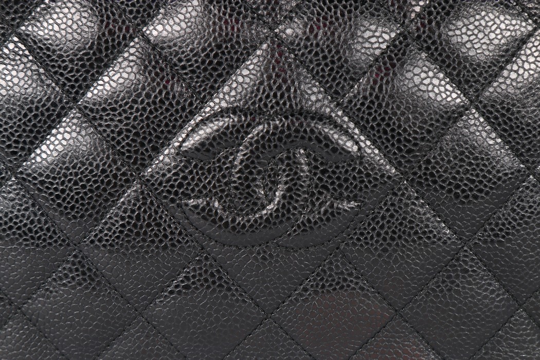 A Chanel caviar leather quilted shoulder bag, 1980s, stamped to interior, with two gilt pendants, - Image 4 of 7