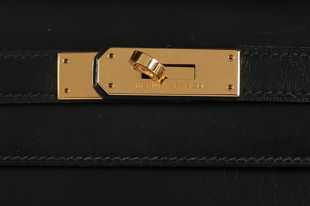 An Hermès black leather Kelly bag, 1993, blind stamp W, with gold-plated metal hardware, - Image 6 of 8