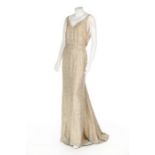 A Norman Hartnell couture ivory and gold sequined evening gown, circa 1938, labelled,