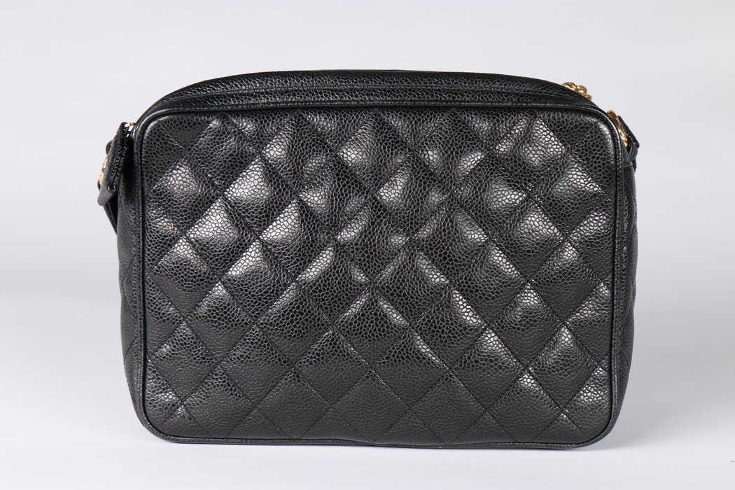 A Chanel caviar leather quilted shoulder bag, 1980s, stamped to interior, with two gilt pendants, - Image 7 of 7