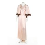 An early Lucien Lelong couture pink satin bias cut evening gown and matching capelet bolero,