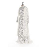 An Irish crochet bridal gown and matching coat, circa 1910, princess-line with high collar,