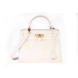 An Hermès off-white leather Kelly bag, 1991, blind stamp U, with gold-plated hardware,