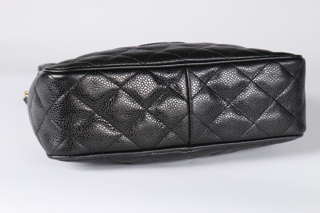 A Chanel caviar leather quilted shoulder bag, 1980s, stamped to interior, with two gilt pendants, - Image 2 of 7