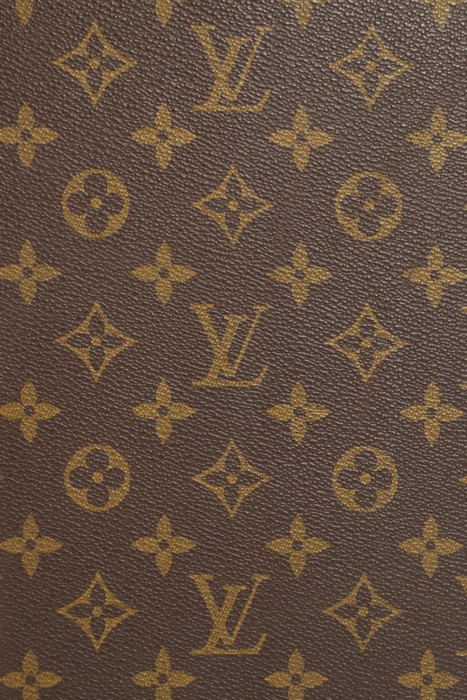 A Louis Vuitton monogrammed hard-sided suitcase, probably 1950s, with leather binding, - Image 8 of 8