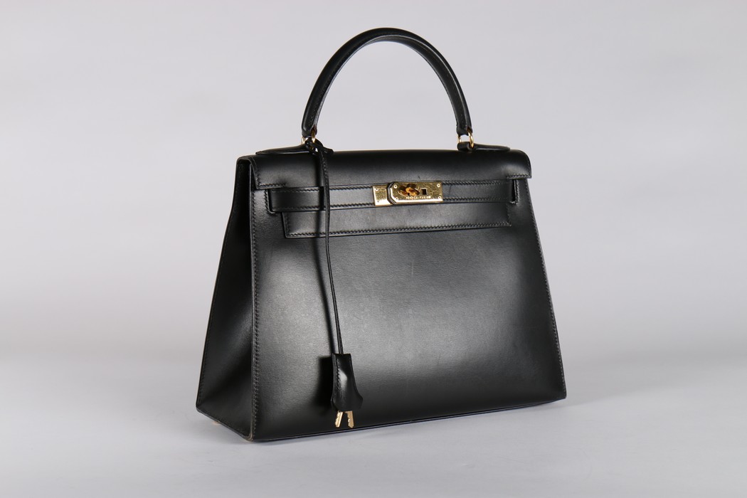 An Hermès black leather Kelly bag, 1993, blind stamp W, with gold-plated metal hardware, - Image 3 of 8