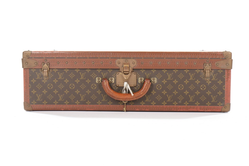 A Louis Vuitton monogrammed hard-sided suitcase, probably 1950s, with leather binding, - Image 5 of 8