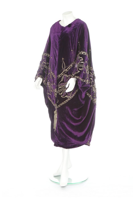 A Hitchens of New York embroidered purple velvet opera cape, circa 1910, large woven label,