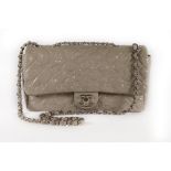A Chanel grey embossed patent leather handbag, modern, stamped to interior,