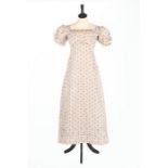 A printed cotton day dress, circa 1825,