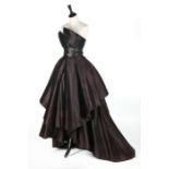 An early and important Christian Dior couture black satin evening gown,