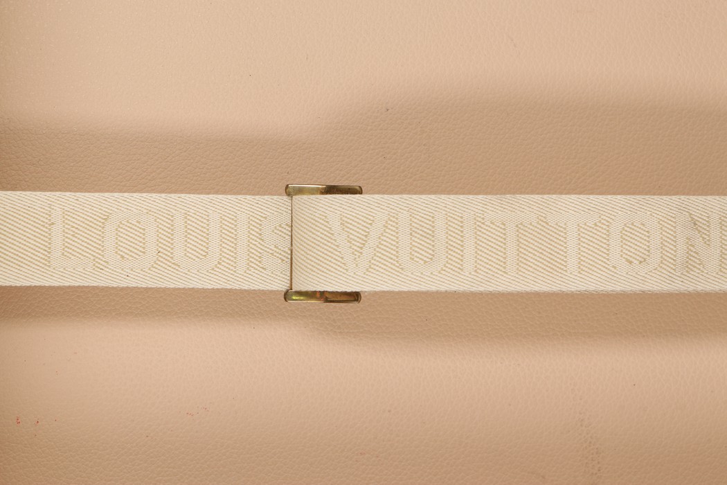 A Louis Vuitton monogrammed hard-sided suitcase, probably 1950s, with leather binding, - Image 7 of 8