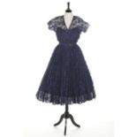 A Robert Piguet couture blue lace cocktail dress, circa 1950,