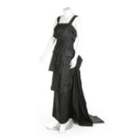 An Edward Molyneux couture black taffeta evening gown, circa 1949, large printed label,