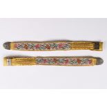 A rare pair of yellow silk and tapestry garters, early 19th century, woven with carnation repeats,