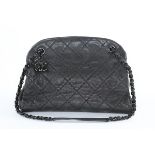A Chanel dark grey leather shoulder bag, modern, stamped to interior, with three compartments,