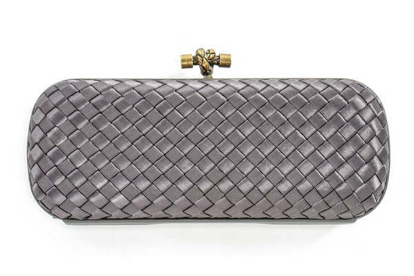 A Bottega Veneta grey ribbon clutch, modern, with 'knot' clasp, approx 25cm,