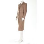 An Hermès light brown tweed suit, late 1940s, labelled and with printed silk lining,