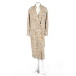 A Chanel boutique tweed summer coat, 1998, labelled and size 40, double-breasted with fringed edges,