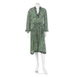 An Ossie Clark printed rayon dress, mid 1970s, un-labelled, with two curved pockets to front skirt,