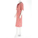 A Chanel Boutique printed crepe de chine dress, 1980s, labelled, with repeats of 'Coco Chanel',