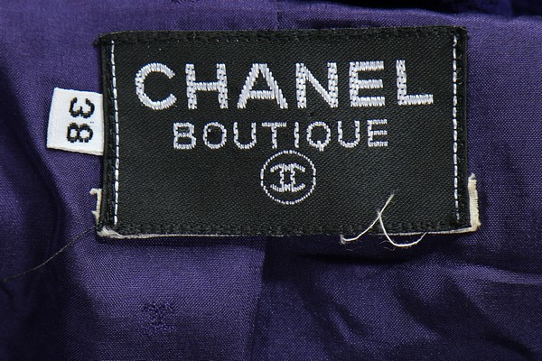 A Chanel boutique purple wool coat-dress, late 1980s, labelled and size 38, - Image 7 of 7