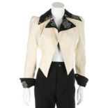 An Ossie Clark/Celia Birtwell cream felted wool cropped jacket, circa 1969, printed satin label,