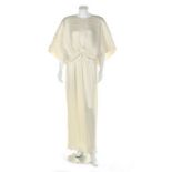 A Yuki pleated ivory satin evening gown, Autumn-Winter 1985, labelled,