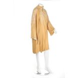 A pearl beaded evening coat, late 1920s, of honey-coloured velvet,