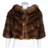 A sable fur bolero, 1960s, labelled 'Kendal Milne, Manchester', with short sleeves, chest 102cm,