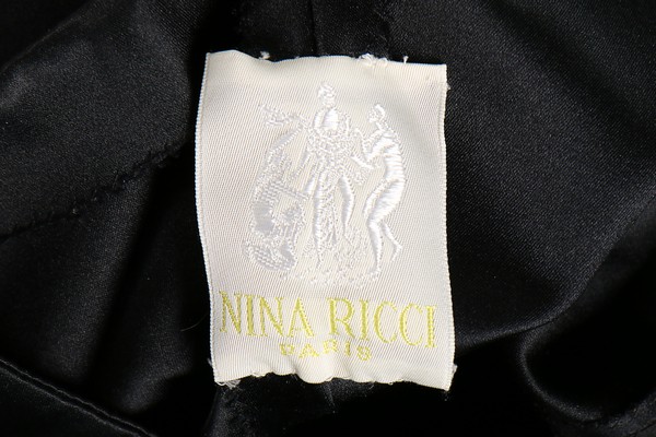 A Nina Ricci couture black satin gown, 1980s, labelled, with tiered tulle skirt, - Image 7 of 7