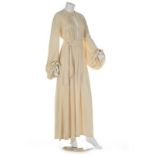 An Ossie Clark ivory moss crepe 'Come Fly With Me' gown, early 1970s, labelled and size 12,