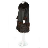 A rare and early Gabrielle Chanel black satin coat, circa 1918-20,