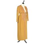 A fine and early Jeanne Lanvin couture medieval inspired mustard crêpe dinner gown, circa 1912-13,