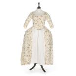 An embroidered linen open robe, English, 1770s, with closed-front bodice,