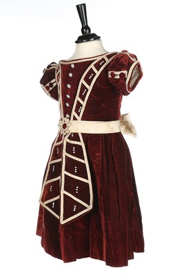 An unusual commemorative child's dress, 1863, of burgundy velvet with ivory satin piping, - Image 2 of 6