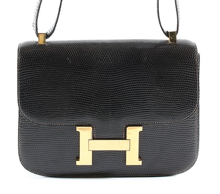 An Hermès dark brown lizard 'Constance' bag, 1980s, Varanus Salvator, stamped to the interior,