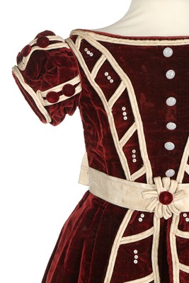 An unusual commemorative child's dress, 1863, of burgundy velvet with ivory satin piping, - Image 4 of 6