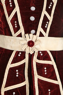 An unusual commemorative child's dress, 1863, of burgundy velvet with ivory satin piping, - Image 5 of 6